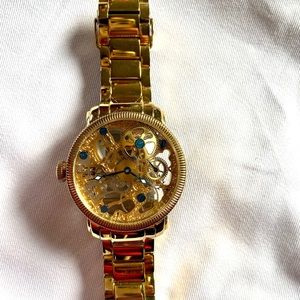 Akribos XXIV AK525YG Gold Mechanical Skeleton Watch Unisex